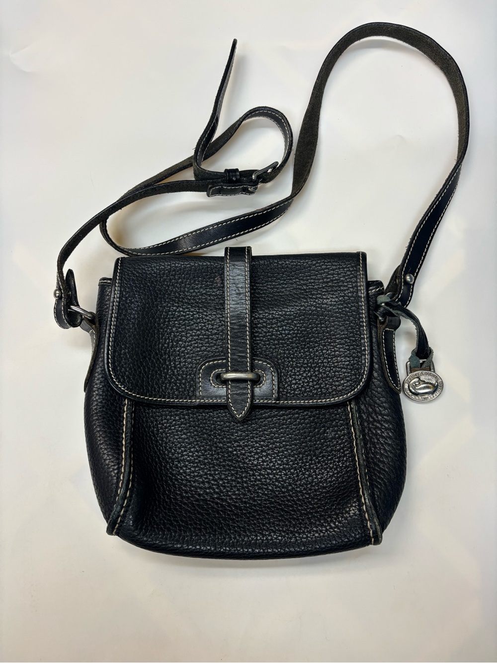 Dooney and Bourke Like new. Authentic. 100% pebbled All Weather Leather. Adjusta